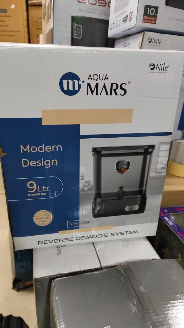 Aqua Mars RO purifier box on shelf at Jay Joganiya RO shop, Gota